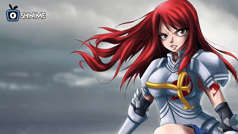 Popular anime characters female: Erza in silver armor and red hair standing strong under stormy skies