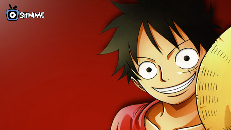 Most Popular anime characters of all time: Luffy smiling in red vest with straw hat against solid red backdrop