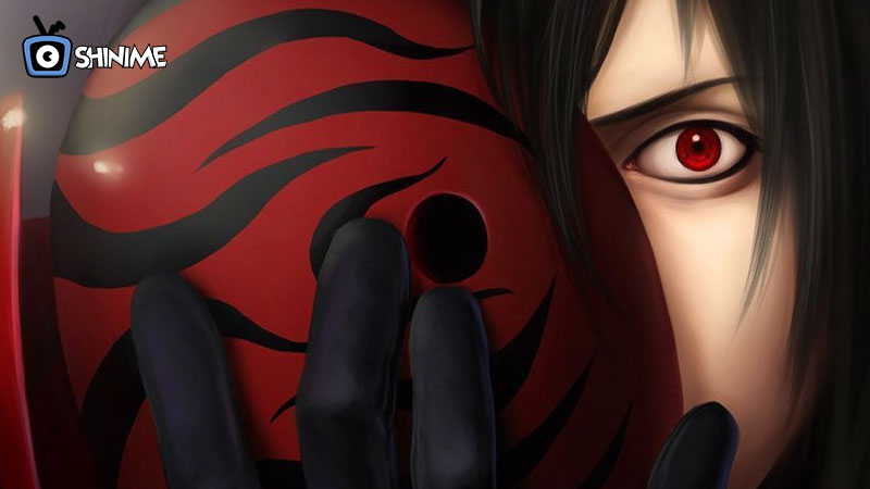 Madara con máscara roja y ojo sharingan visible, uno de los powerful anime characters más temidos