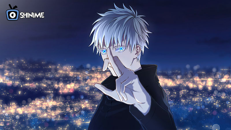 Popular anime characters male: Gojo pointing forward, glowing blue eyes above city lights at night