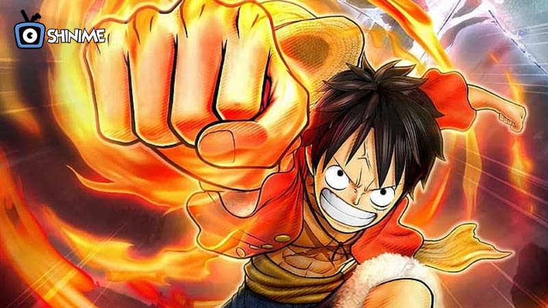 Popular anime characters male: Luffy punching with fiery fist, red vest and straw hat flying back