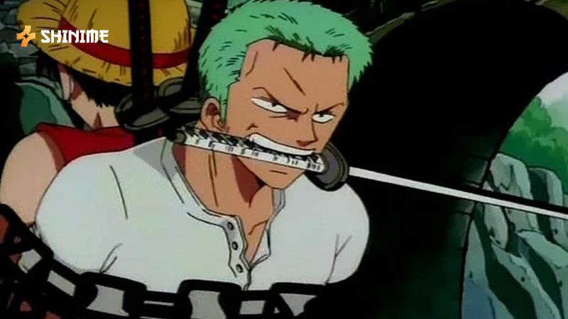 Zoro wielding three swords with fierce focus during battle in One Piece Movie 1
